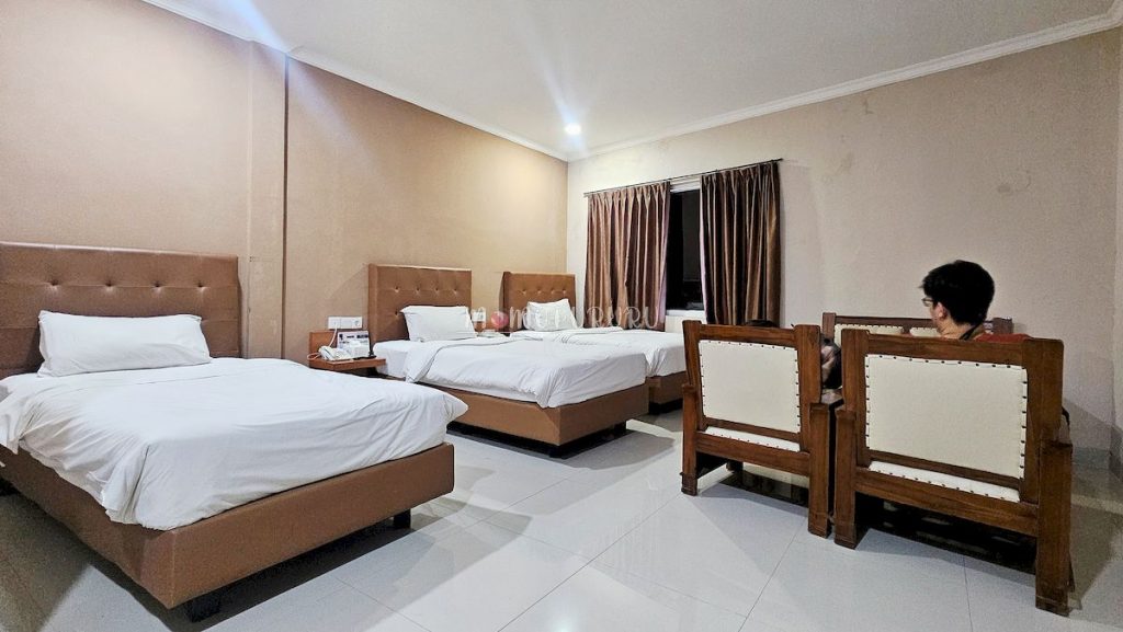 Kamar dengan 3 single bed